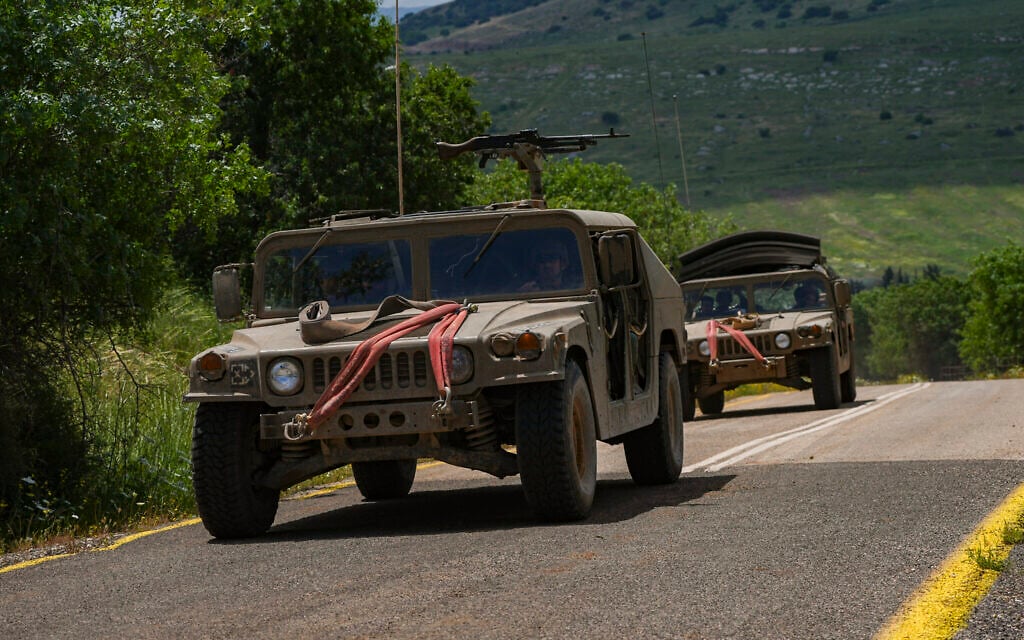 Israeli military vehicles are seen along the border with Lebanon, April 28, 2026. (Ayal Margolin/Flash90)