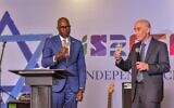 Then-Israeli ambassador to Kenya Michael Lotem, right, marks Israel's annual Independence Day, May 2023. (Israel Foreign Ministry)