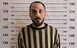 Former Syrian intelligence officer Amjad Yousef after his arrest in the central province of Hama, in an image published on April 24, 2026. (Syrian Interior Ministry/X)