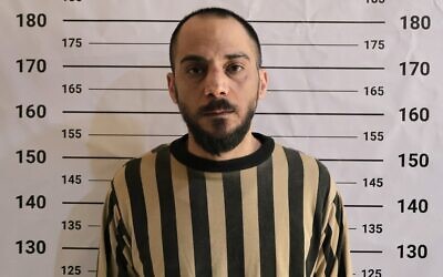 Former Syrian intelligence officer Amjad Yousef after his arrest in the central province of Hama, in an image published on April 24, 2026. (Syrian Interior Ministry/X)