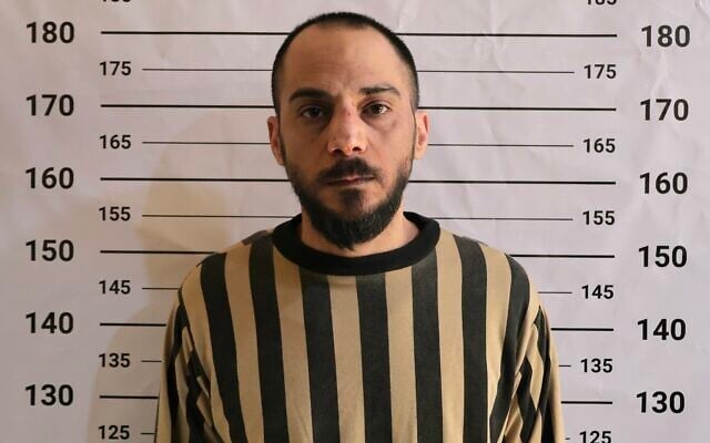 Former Syrian intelligence officer Amjad Yousef after his arrest in the central province of Hama, in an image published on April 24, 2026. (Syrian Interior Ministry/X)