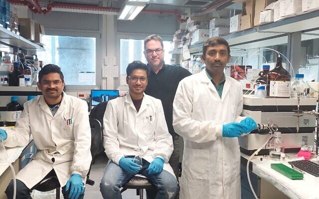 From left to right, Rajesh Pallava, Pallab Karjee, lab manager Guy Kamnesky, and Ashok Donthoju at the Ashraf Brik lab in the Shulich Faculty of Chemistry at the Technion-Israel Institute of Technology on March 24, 2026. (Diana Bletter/Times of Israel)