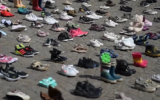 Shoes are displayed in Amsterdam's Dam Square in a pro-Palestinian exhibition, April 12, 2026.  (Screenshot/YouTube; used in accordance with Clause 27a of the Copyright Law)