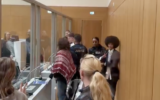 Suspects in the Palestine Action Germany attack on an Israeli defense firm in Ulm enter the courtroom in Stuttgart, Germany, on April 27, 2026. (Screen capture: X, used in accordance with Clause 27a of the Copyright Law)