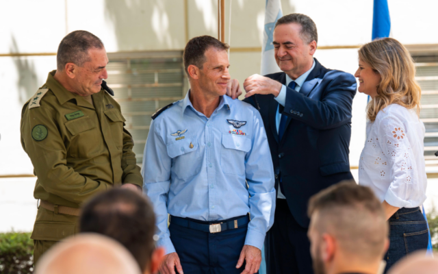 Defense Minister Israel Katz (right) and IDF Chief of Staff Lt. Gen. Eyal Zamir (left) award incoming Israeli Air Force chief Omer Tischler the rank of major general, at the IDF HQ in Tel Aviv, April 30, 2026. (Israel Defense Forces)