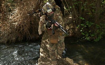 Syrian army soldiers patroling along the Syrian-Lebanese border in the rural area of Al Qusayr on April 1, 2026. (Bakr Alkasem/AFP)