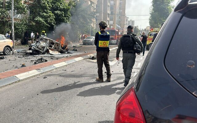 Rescue workers at the scene of an impact in Ramat Gan following an Iranian missile attack, April 4, 2026 (MDA) Rescue workers at the scene of an impact in Ramat Gan following an Iranian missile attack, April 4, 2026 (MDA)