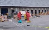 Hazmat officials examining a suspicious object at Ben-Gurion International Airport on April 5, 2026. (Fire and Rescue Service)