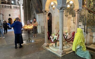 Christian worshipers visit the Church of the Holy Sepulchre to mark Orthodox Easter and to attend the first public Sunday services by other Christian denominations after the war on April 12, 2026. (Rossella Tercatin/Times of Israel)