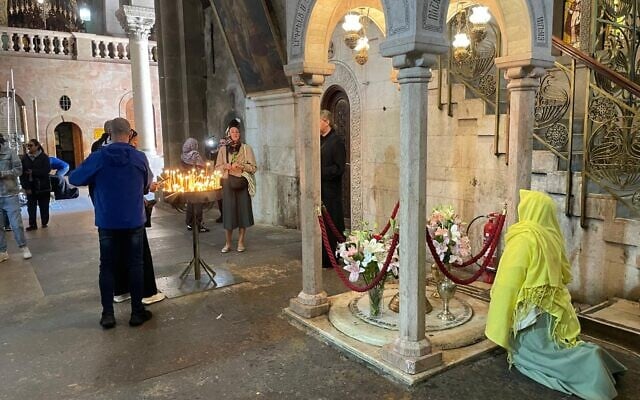 Christian worshipers visit the Church of the Holy Sepulchre to mark Orthodox Easter and to attend the first public Sunday services by other Christian denominations after the war on April 12, 2026. (Rossella Tercatin/Times of Israel)
