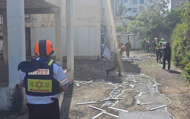 First responders arrive at the scene of a Hezbollah rocket strike in Nahariya, northern Israel, on April 13, 2026. (Magen David Adom)