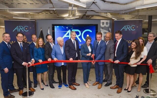 Massachusetts Governor Maura Healey (center) cuts the ribbon at the launch of ARC Landing Boston on April 15, 2026. To her left is ARC Landing Boston CEO Dr. Yonatan Keschner, and to her right is Prof. Yitshak Kreiss, Sheba Medical Center's director general, as well as philanthropist Robert Kraft, among others.