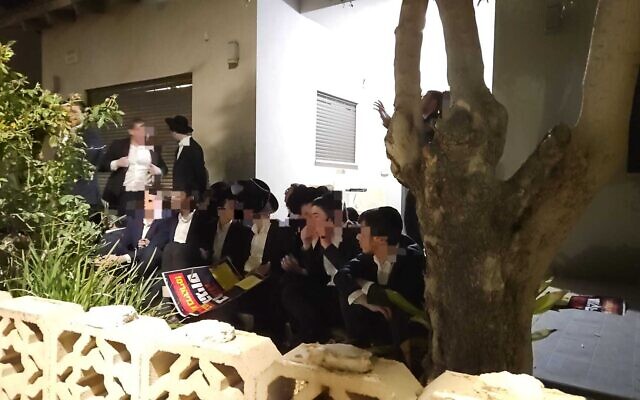 Haredi extremists protesting the arrest of a draft evader break into the backyard of the house of Military Police chief Brig. Gen. Yuval Yamin in Ashkelon, April 28, 2026. (Israel Police) Haredi extremists protesting the arrest of a draft evader break into the backyard of the house of Military Police chief Brig. Gen. Yuval Yamin in Ashkelon, April 28, 2026. (Israel Police)