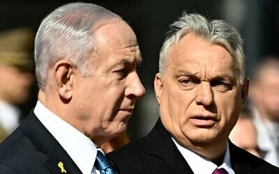 Hungary's Prime Minister Viktor Orban, right, and Israeli Prime Minister Benjamin Netanyahu review a military honor guard on April 3, 2025, in Budapest, Hungary. (Attila KISBENEDEK / AFP)
