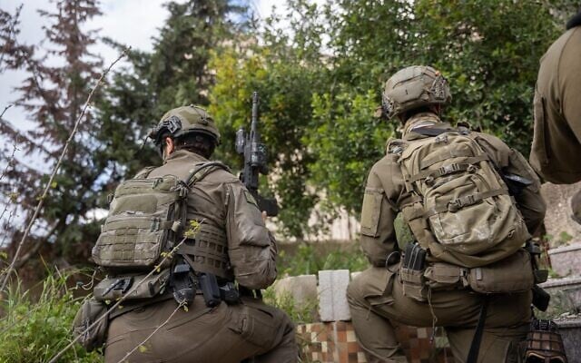 Soldiers of the Paratroopers Brigade operate in the southern Lebanon town of Bint Jbeil, in a handout photo issued by the military on April 14, 2026. (Israel Defense Forces)