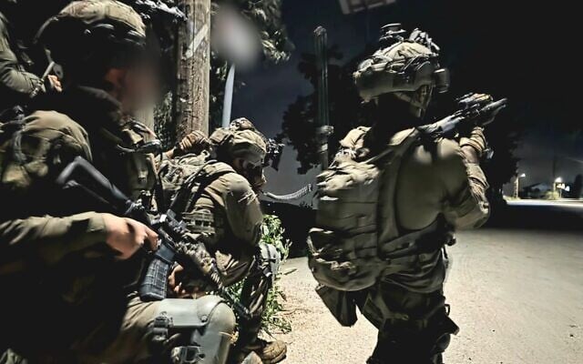 Troops of the 769th "Hiram" Regional Brigade operate in the southern Lebanon village of Dibbine, in a handout photo issued on April 22, 2026. (Israel Defense Forces)