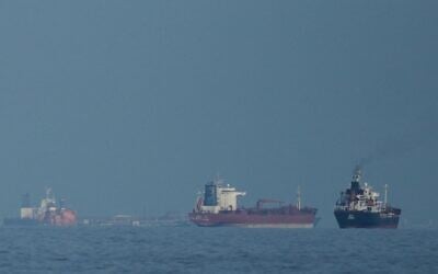 Oil tankers and cargo ships lining up in the Strait of Hormuz as seen from Khor Fakkan, United Arab Emirates, March 11, 2026. (AP Photo/Altaf Qadri) Oil tankers and cargo ships lining up in the Strait of Hormuz as seen from Khor Fakkan, United Arab Emirates, March 11, 2026. (AP Photo/Altaf Qadri)