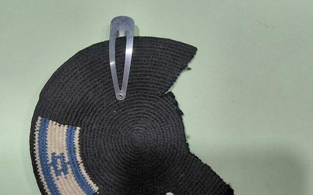 Alex Sinclair's mutilated kippa, with an Israeli flag intact and a Palestinian flag removed, as pictured on April 23, 2026. (Alex Sinclair) Alex Sinclair's mutilated kippa, with an Israeli flag intact and a Palestinian flag removed, as pictured on April 23, 2026. (Alex Sinclair)