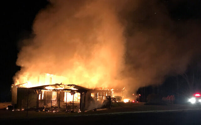 This March 29, 2019, photo provided by the New Market Fire and Rescue Team shows a fire at the main offices of the Highlander Research and Education Center in New Market, Tenn. (Sammy Solomon/New Market Fire and Rescue Team/AP) This March 29, 2019, photo provided by the New Market Fire and Rescue Team shows a fire at the main offices of the Highlander Research and Education Center in New Market, Tenn. (Sammy Solomon/New Market Fire and Rescue Team/AP)