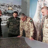 Mohammed Odeh, right, along with senior Hamas leaders Rafa’a Salameh, Abu Obeida, and Mohammed Deif, in an undated photo. (Used in accordance with Clause 27a of the Copyright Law)