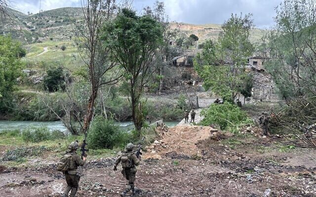 IDF troops operate at the Litani River in southern Lebanon, in a handout photo published by the military on May 12, 2026. (Israel Defense Forces)
