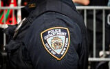 An NYPD officer at an anti-Israel protest, September 23, 2025. (Luke Tress/ Times of Israel/ File)