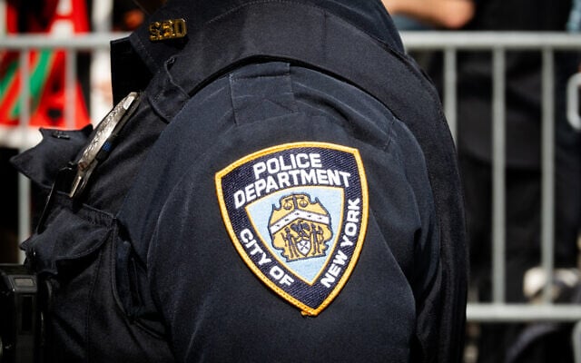 An NYPD officer at an anti-Israel protest, September 23, 2025. (Luke Tress/ Times of Israel/ File)