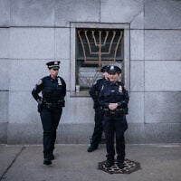 Police outside a Jewish center during an anti-Zionist rally, in Brooklyn, New York City, May 12, 2026. (Luke Tress/Times of Israel)