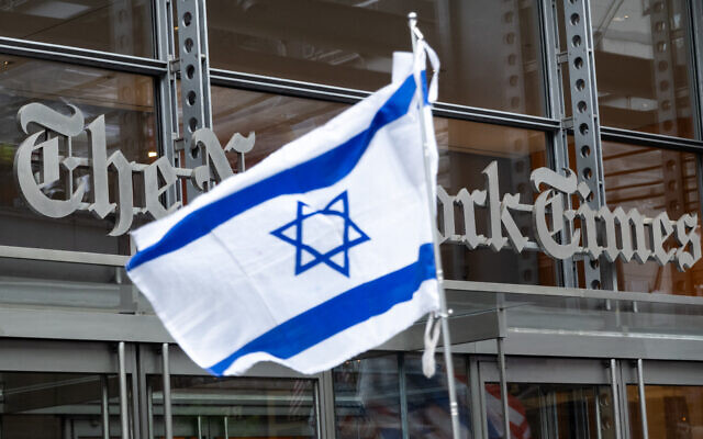Protesters outside The New York Times offices in New York City, May 14, 2026. (Luke Tress/Times of Israel)
