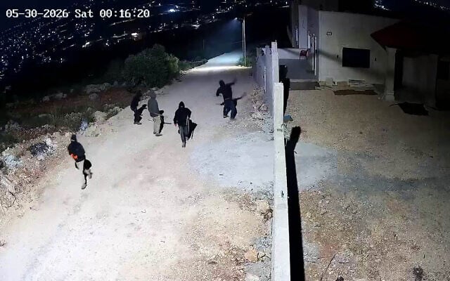 Five settlers are seen on security camera footage captured early on May 30, 2026, as they attack a home on the outskirts of the Palestinian town of Beita, south of Nablus in the northern West Bank. (Screen capture: X, used in accordance with Clause 27a of the Copyright Law)
