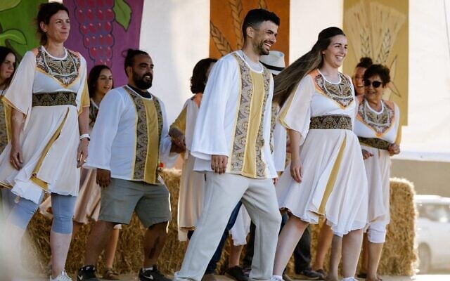 Traditional dances at Kibbutz Nahal Oz on May 22, 2026 Shavuot holiday celebrations (Courtesy)