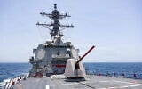 Arleigh Burke-class guided-missile destroyer USS Rafael Peralta (DDG 115) patrols the Arabian Sea enforcing a maritime blockade against ships entering or exiting Iranian ports and coastal areas, May 18, 2026.  (US Navy photo)