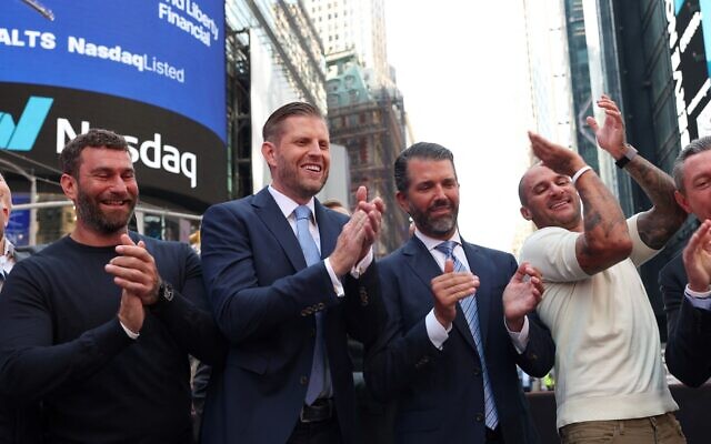 Eric Trump and Donald Trump Jr. pose outside Nasdaq in Times Square in New York on August 13, 2025 as World Liberty Financial and ALT5 Sigma ring the Nasdaq Stock Market opening bell. (TIMOTHY A. CLARY / AFP) Eric Trump and Donald Trump Jr. pose outside Nasdaq in Times Square in New York on August 13, 2025 as World Liberty Financial and ALT5 Sigma ring the Nasdaq Stock Market opening bell. (TIMOTHY A. CLARY / AFP)