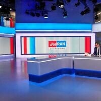 Illustrative: A presenter for dissident Persian-language TV station Iran International prepares for a news broadcast at the network's studio in London on January 20, 2026. (Carlos Jasso / AFP)