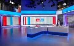 Illustrative: A presenter for dissident Persian-language TV station Iran International prepares for a news broadcast at the network's studio in London on January 20, 2026. (Carlos Jasso / AFP)
