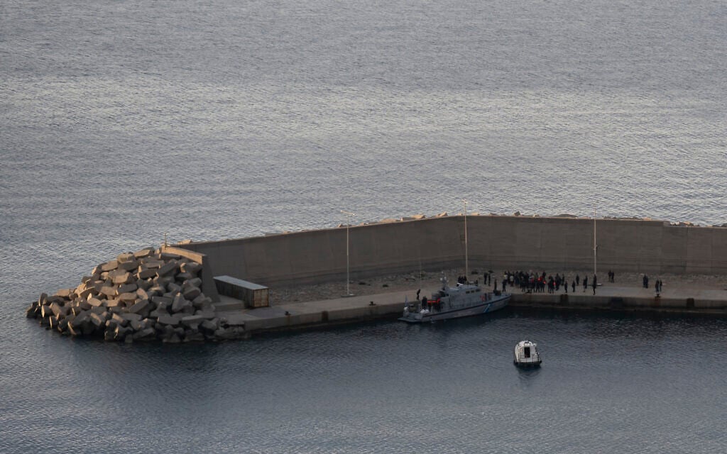 A Greek Coast Guard vessel carrying activists from the Global Sumud Flotilla, which had been intercepted by the Israeli Navy in international waters, arrives at the port of Atherinolakkos on the island of Crete, on May 1, 2026. (Eleftherios Elis MITZA / AFP)