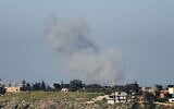 Smoke rises from the site of an Israeli airstrike that targeted Hezbollah in the southern Lebanese village of Zawtar on May 2, 2026. (AFP)