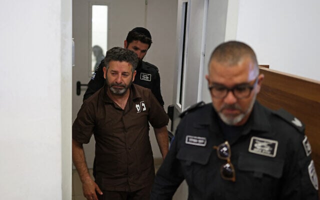 Security personnel escort Spanish activist Saif Abu Keshek to a court in Ashkelon on May 3, 2026. (Ilia YEFIMOVICH / AFP) Security personnel escort Spanish activist Saif Abu Keshek to a court in Ashkelon on May 3, 2026. (Ilia YEFIMOVICH / AFP)