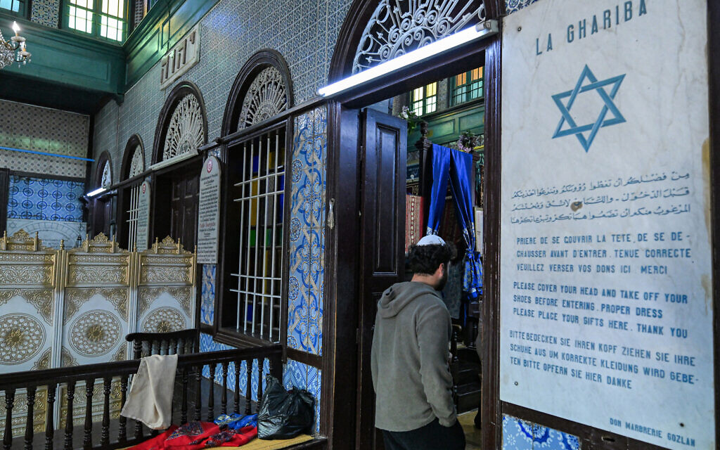 A Jewish man stands inside the historic Ghriba synagogue on Tunisia's southern island of Djerba, a day before the pilgrimage to the Jewish holy site, on May 3, 2026. (FETHI BELAID / AFP)