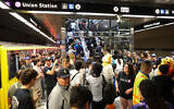 Passengers disembark at the Wilshire/La Cienega station during the opening of the Metro D Line subway extension in Los Angeles on May 8, 2026. (Patrick T. Fallon/AFP)