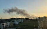 Smoke rises from the site of an Israeli airstrike that targeted the southern village of Kfar Jaouz on May 10, 2026. (Abbas Fakih / AFP)
