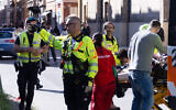 Rescuers work on the scene after a driver injured seven people in Modena, Italy, May 16, 2026. (Giorgia Bassoli / AFP)