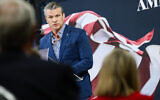 US Secretary of War Pete Hegseth speaks on stage during an America First Workers Special Event on May 18, 2026 in Hebron, Kentucky. (Jon Cherry/Getty Images/AFP)
