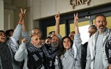 Members of the Global Sumud Flotilla headed for Gaza and arrested and deported by Israel pose outside a terminal following their arrival at Istanbul Airport on May 21, 2026. (Photo by Ozan KOSE / AFP)