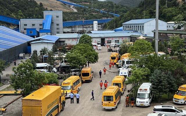 A general view of rescue team members and emergency vehicles arriving at the Liushenyu coal mine after a gas explosion in Changzhi, in northern China's Shanxi province, on May 23, 2026. (CNS / AFP)