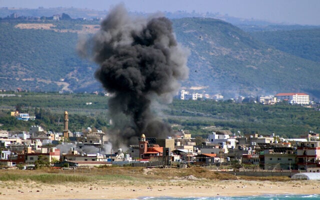 Smoke rises following an Israeli airstrike on the Rashidieh Palestinian refugee camp in the Tyre district of southern Lebanon on May 25, 2026. (Photo by KAWANT HAJU / AFP)