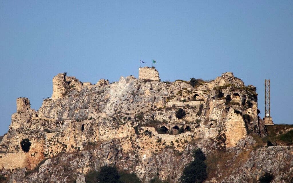 The Israeli and Golani Brigade flags are seen over the Beaufort Castle in southern Lebanon, as seen from the Marjayoun area of southern Lebanon on May 31, 2026 (AFP)