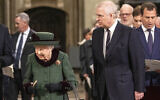 Britain's Queen Elizabeth II, left, and Prince Andrew, center right, arrive for a Service of Thanksgiving for the life of Prince Philip, Duke of Edinburgh, at Westminster Abbey in London on March 29, 2022. (Richard Pohle/Pool via AP)