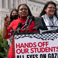 Then-US Rep. Cori Bush and US Rep. Rashida Tlaib, accompanied by George Washington University students, speak during a news conference at the US Capitol, May 8, 2024, in Washington, DC. (AP/Jose Luis Magana)