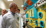 In this photo released on November 2, 2025, by the Atomic Energy Organization of Iran, President Masoud Pezeshkian visits the country's nuclear facilities during his tour to the Atomic Energy Organization in Tehran, Iran. (Atomic Energy Organization of Iran via AP)